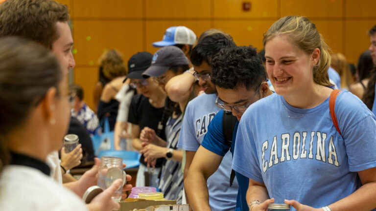 Photo of students engaging with one another at 2024 FallFest.